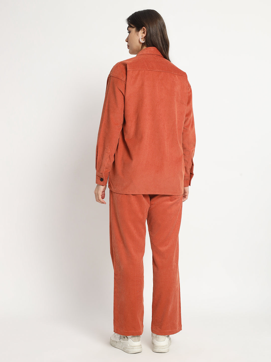 a man standing on a snow covered ski slope