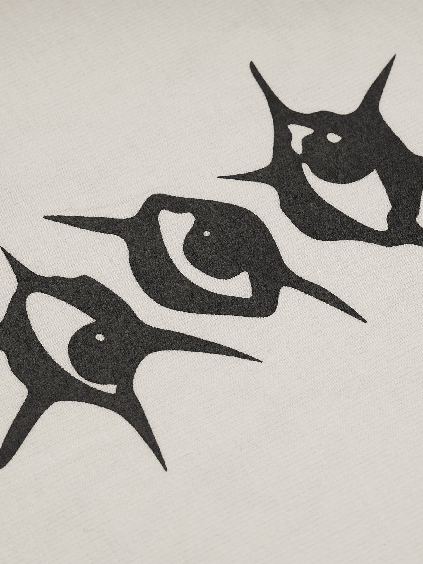 a flock of birds flying in the sky