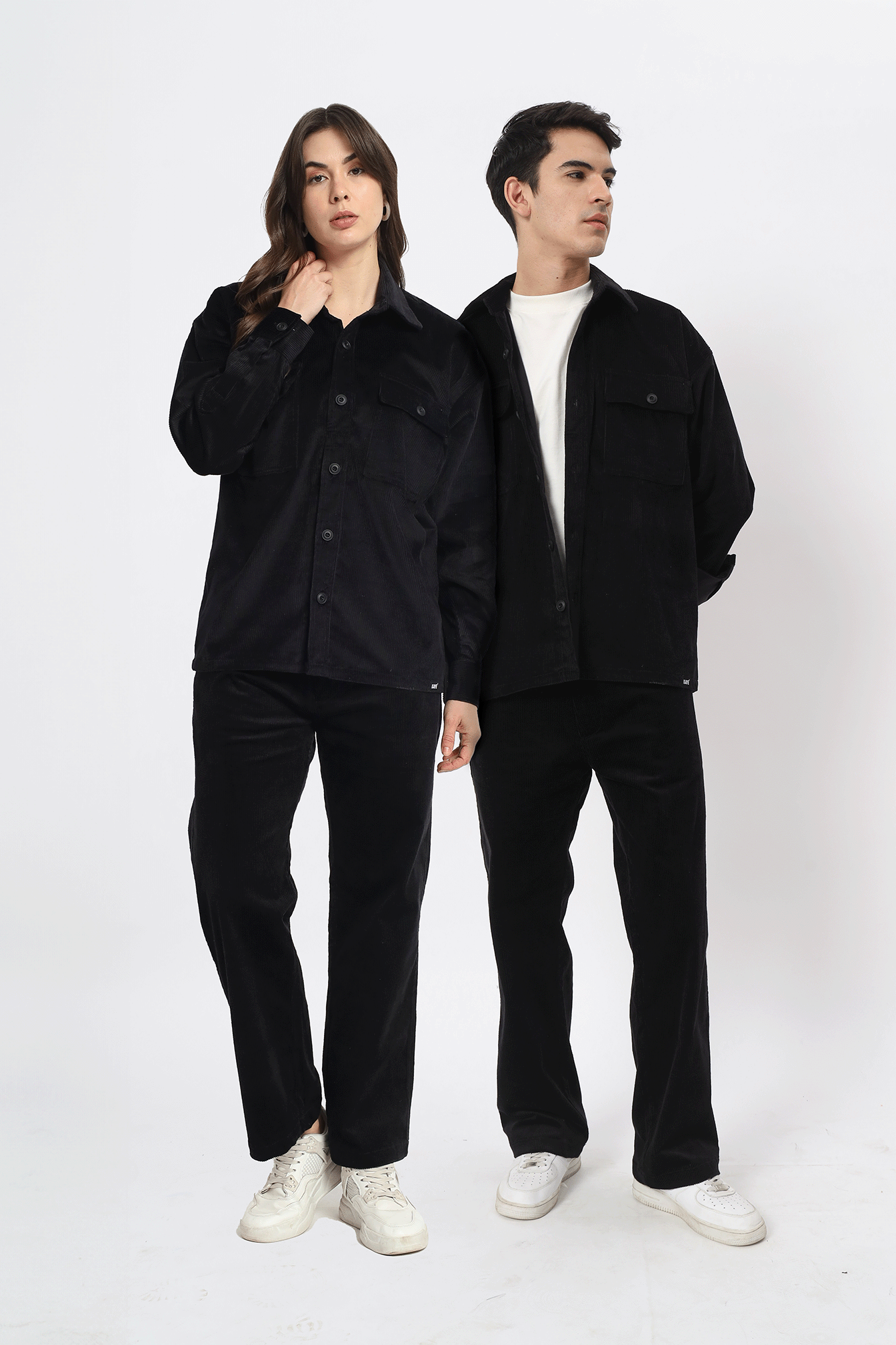 a couple of men standing next to each other
